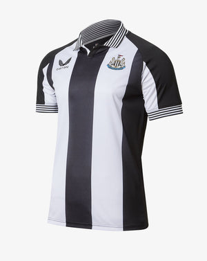 Junior black and white Newcastle retro home shirt